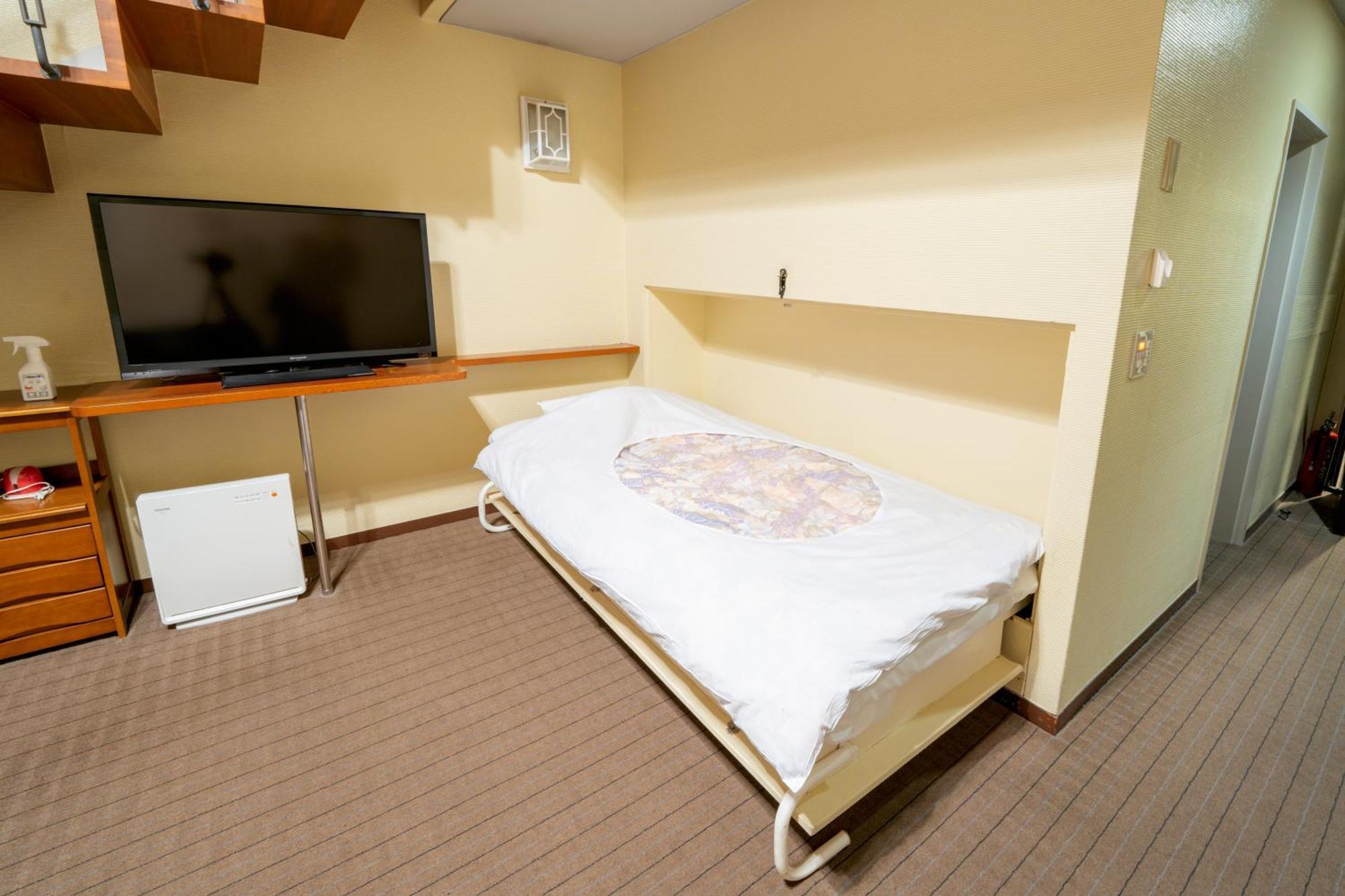 富士祥栄会館 Hotell Oyama  Rom bilde